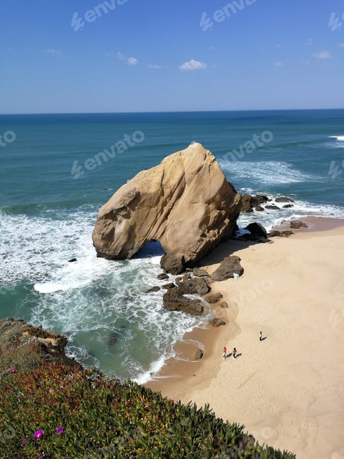 Preview: Bing Rock In A Sandy Beach. Portugal Santa Cruz