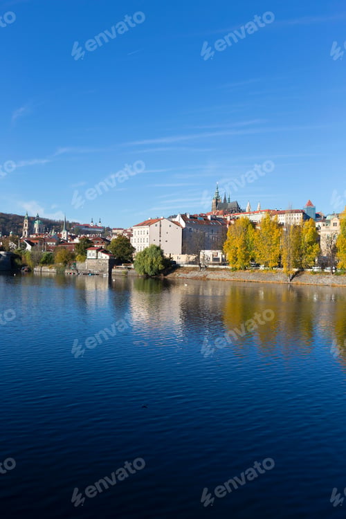 Preview: Colorful Autumn Prague Gothic Castle With The Lesser Town Above River Vltava In The Sunny Day