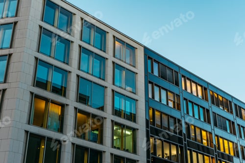 Preview: Cold Colored Apartment Building With Square Windows