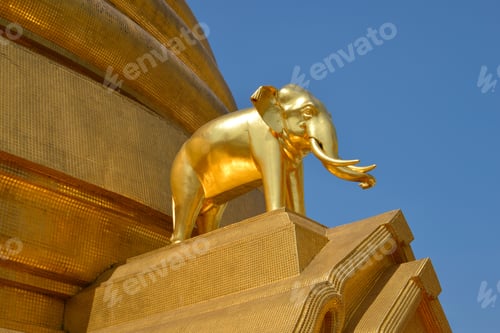 Preview: Golden Elephant Sculpture On The Base Of The Chedi Of The Buddhist Temple Of Wat Wihan Bovornniwet