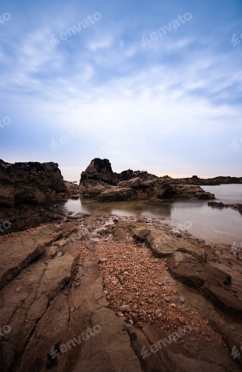 Preview: Long Exposure In Amazing Wild Rock Beach At The Sunset. Sintra Cascais Natural Park