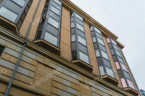 Preview: Low Angle Exterior View Of Modern Office Building Looking Upwards