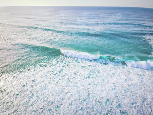 Preview: Aerial View From A Surfer Taking A Wave. Drone Shot