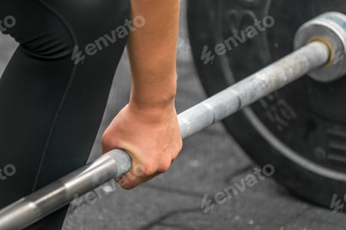 Preview: Hand Pickung Up A Barbell In Weight Training