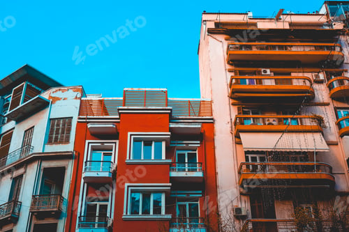 Preview: Red And Orange Buildings With Copy Space In The Sky