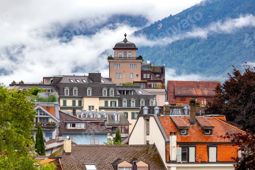 Preview: Interlaken. Aerial View Of The City Rooftops And Mountains.