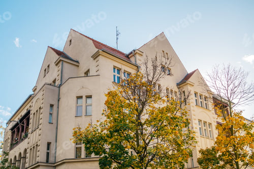 Preview: Big Apartment Complex With Autumn Tree In The Middle