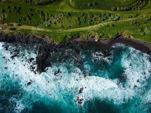Preview: Aerial Top View Of Sea Waves Hitting A Beach With Black Volcanic Sand With Turquoise Sea Water