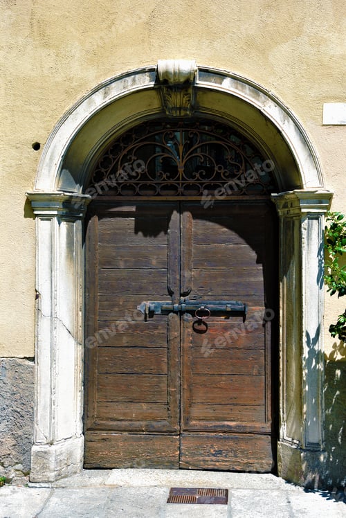 Preview: Ancient Wooden Portal Of A Historic Building In Como Italy