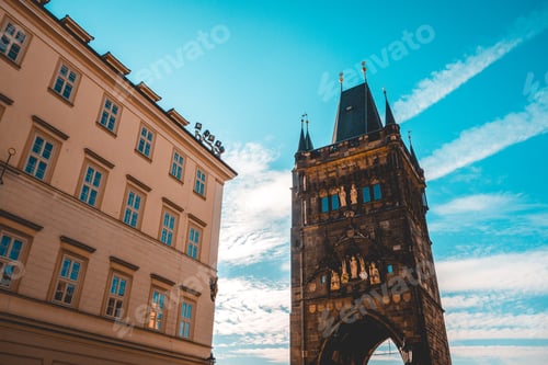 Preview: The Old Town Bridge Tower, Viewed From Low Angle, Against Blue Sky With Contrails. Prague, Czech