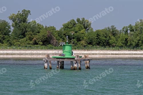 Preview: Small Green Lighthouse In Harbour Channel Near Venice