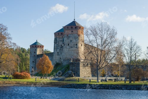 Preview: The Medieval Fortress Of Olavinlinna In The October Landscape On A Sunny Afternoon. Savonlinna