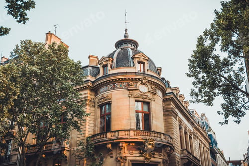 Preview: Elegantly Decorated Cupola With Little Dormer Windows On Old European Urban House Surrounded By