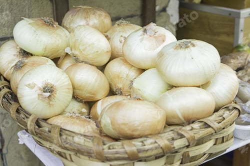 Pile of Onions in a Woven Basket