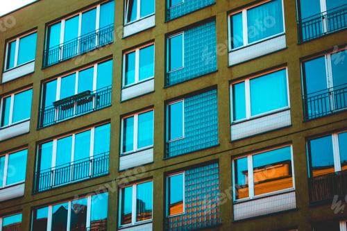 Preview: Orange Square Facaded Apartment House With Big Windows