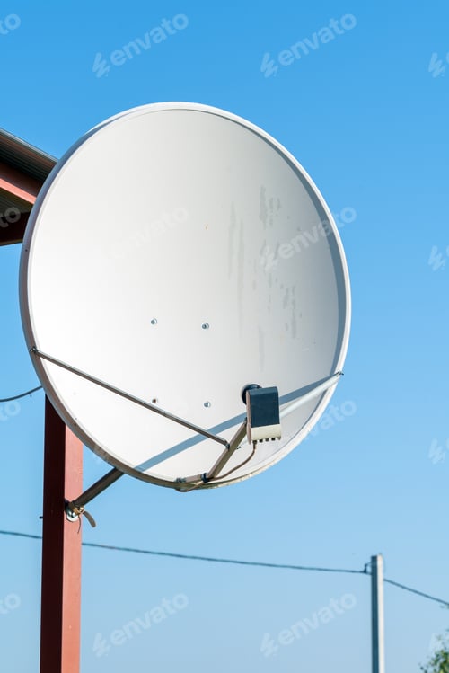 Preview: Large Gray Satellite Dish Antenna On The Garden House Pillar