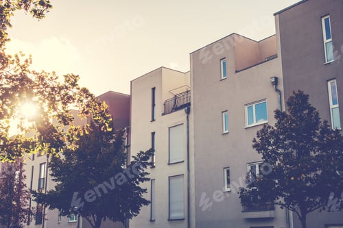Preview: High Contrasted Townhouses In Autumn With Warm Sunlight