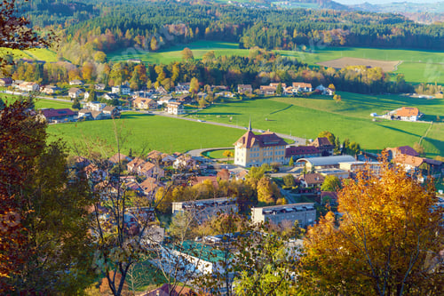 Preview: Aerial View Of A Beautiful Landscape With Traditional Houses, Green Meadows, Hills And Cows Near