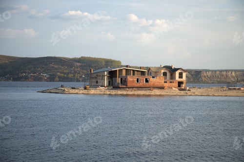 Preview: Kazan, Russia - May 02, 2016: Construction Of A Cottage On The Alluvial Spit In The Waters Of The