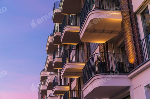 Preview: Modern And Curved Balcony On Brick Facade In The Afternoon