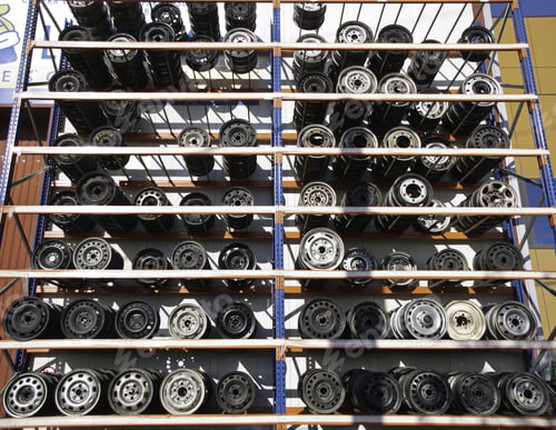 Preview: Mechanical Workshop With Shelving Rims And Wheels On The Outside, Industrial Building
