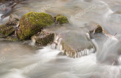 Preview: Moss Covered Rocks In Flowing Water