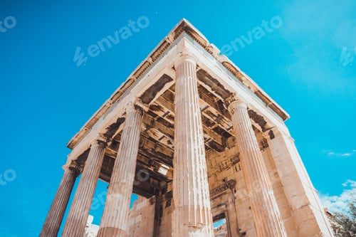 Preview: Tall Classical Ancient Doric Columns On A Ruined Greek Temple Viewed From Below Looking Up Against