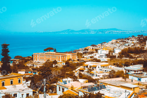 Preview: Orange Colored Houses At Italy With Ocean In The Background