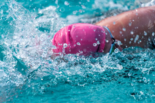 Preview: Close Of A Swimmer In Blue Water