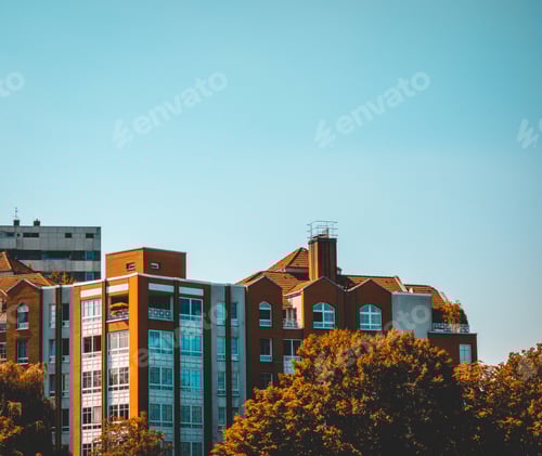 Preview: White And Orange Colored Apartment Buildings At Berlin