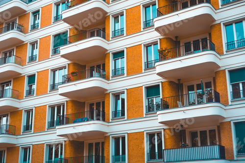 Preview: Orange Facade With White Curved Balcony