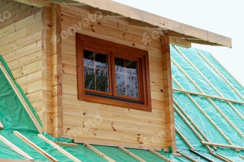 Preview: Roof Window On Wooden Log House During Renovation
