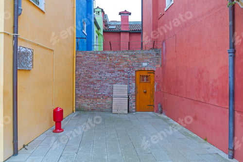Preview: Brick Wall With Door Between Houses In Burano Venice