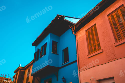 Aperçu: Blue And Orange Ancient Houses With Clean Sky