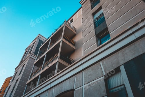 Preview: Low Angle View Of Residential Apartment House Facade In White Colors