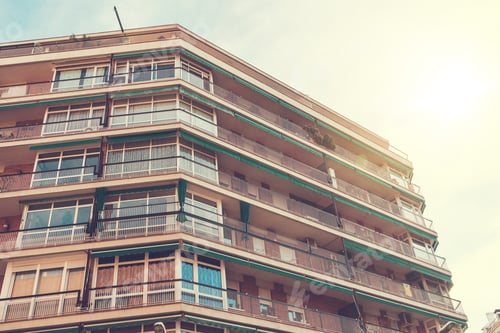 Preview: Typical Spanish Building With Big Balconies In Sunlight