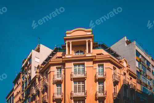 Preview: Orange Corner Building With Darken Blue Sky