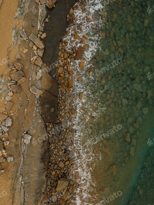 Preview: Aerial View Of Sandy Beach With Waves And Clear Ocean Water. Drone Photo