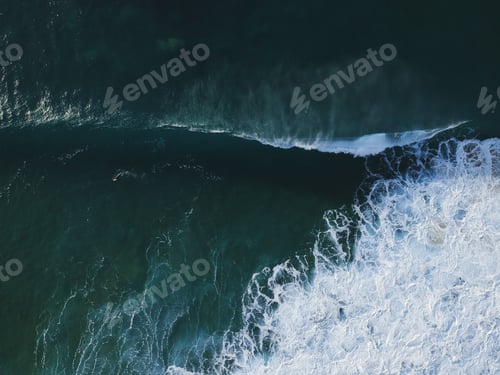 Preview: Aerial View From A Surfer Taking A Wave. Drone Shot