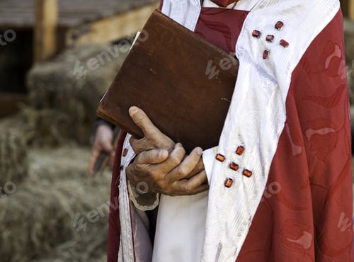 Preview: Priest With Bible And Priestly Clothing In Celebration, Religion And Christian