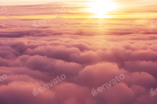 Preview: Beautiful Blazing Sunrise Landscape Above Clouds. View From Aircraft. Sunset And Sunrise Concept