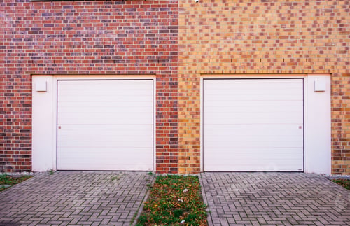 Preview: White Garages On Brown Brick Building
