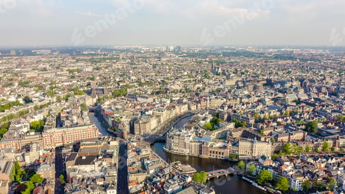 Preview: Amsterdam, Netherlands. Flying Over The City Rooftops. The Historical Part Of The City With Urban