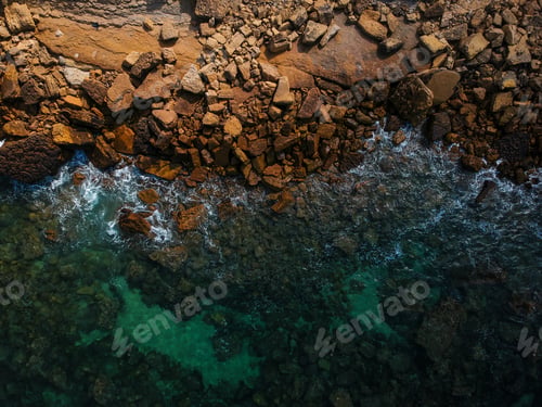 Preview: Aerial View Of Waves, Rocks And Transparent Sea. Summer Seascape. Top View From Drone. Rocky