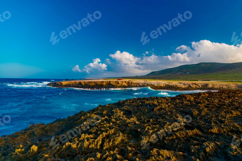 Preview: Sunset Over The Aruba National Park In The Caribbean Sea With The Desert That Meets The Ocean With