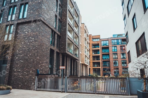Preview: Low Angle View Of Gated Driveway Buildings In Contemporary Housing Complex