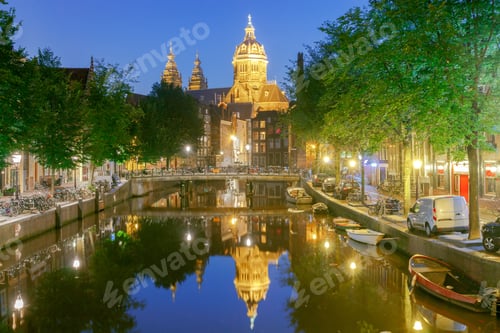 Preview: Facades Of Traditional Dutch Houses On The Canal In The Night Light. Red Light District. Amsterdam