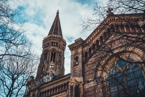 Preview: Darken Church With Windows And Tower And Blue Sky