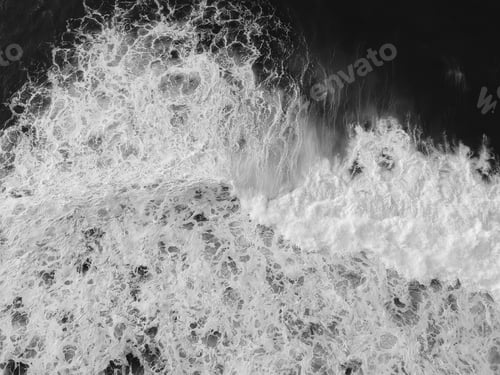 Preview: Aerial Top View Of Ocean Wave With Foam. Drone Photo