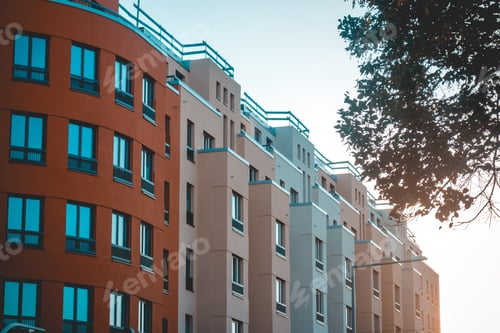 Preview: Very Modern Apartments From Exterior View With Tree On The Side And Warm Sunlight In The Background